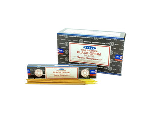 Two boxes of Nag Champa Black Opium incense on a white background