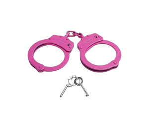 Pink handcuffs with keys on a white background
