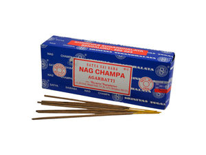 Box of Nag Champa incense sticks with sticks displayed in front on a white background