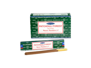 Two boxes of Satya Patchouli Forest incense with two sticks on a white background