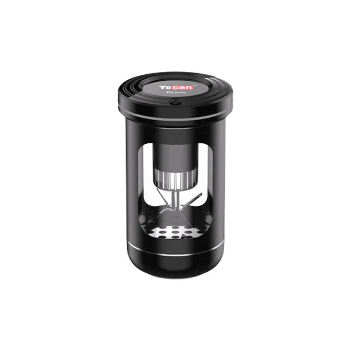 Black coffee grinder with transparent top on a white background