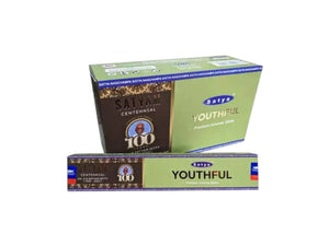 Three boxes of Satyam incense sticks on a white background