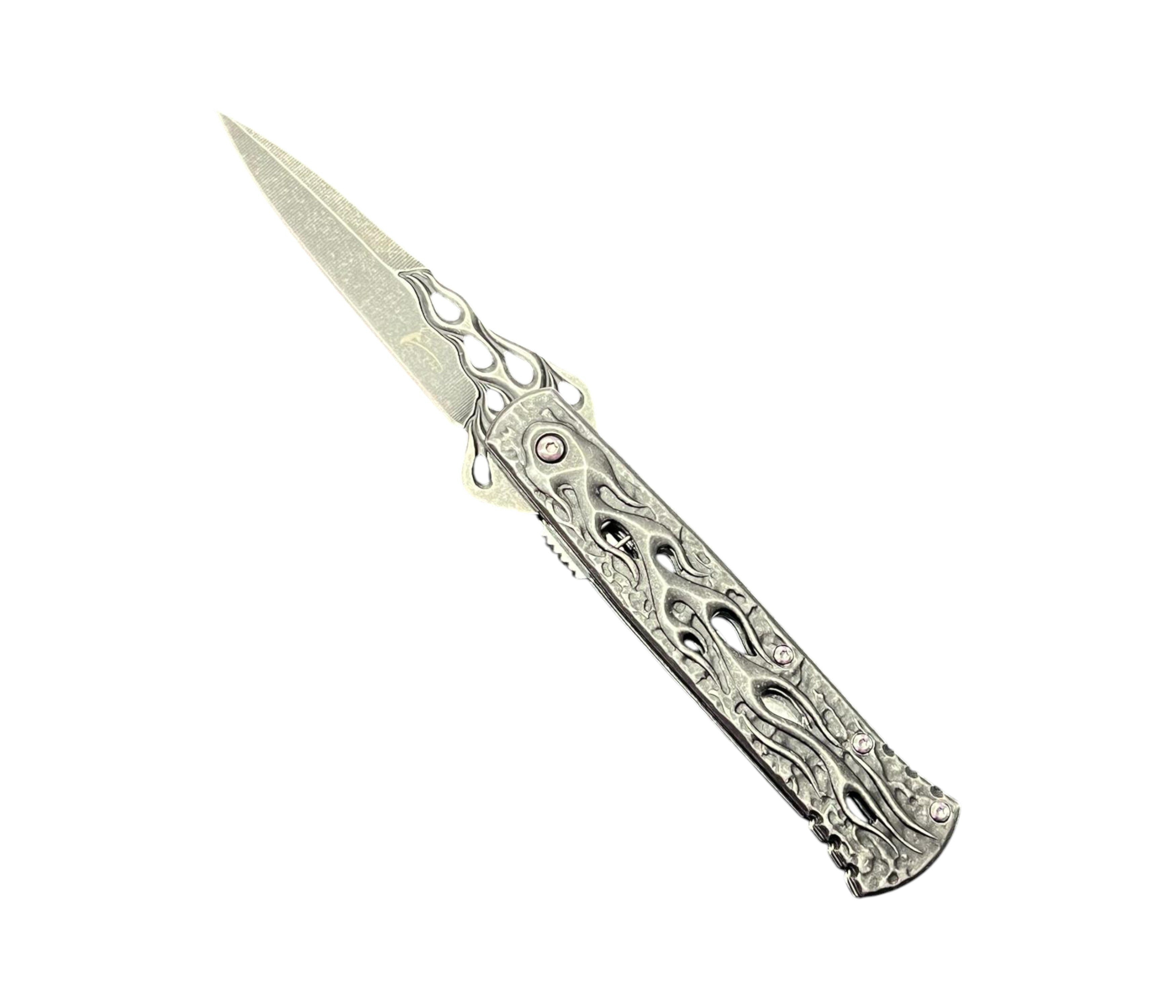 Decorative folding knife on a white background